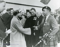 The Queen shaking Hands with Calum Ùisdean 1956 by Comann Eachdraidh Uibhist a Tuath
